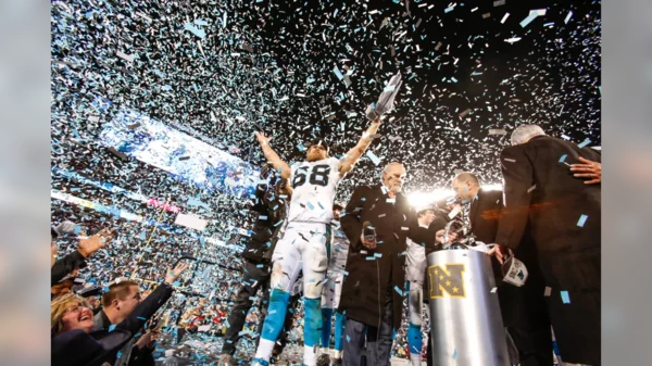 Greg Olsen on stage after winning the NFC Championshipo (2015).webp
